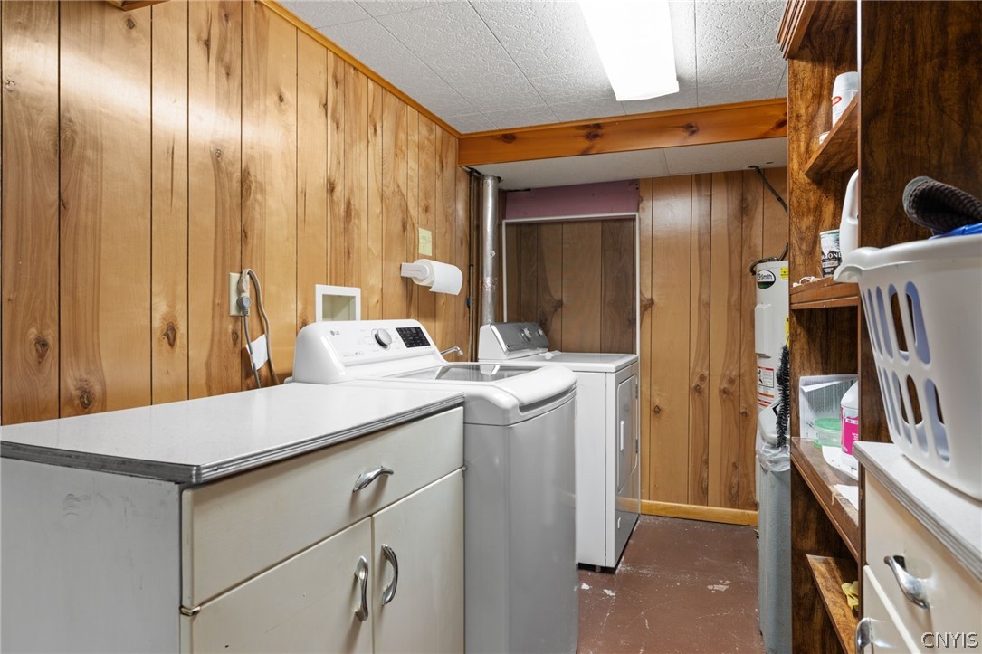 410 Meadow Road Geddes, NY 13219 - Photo 35 of 50 Unfinished area that has washer, dryer and hot water heater.