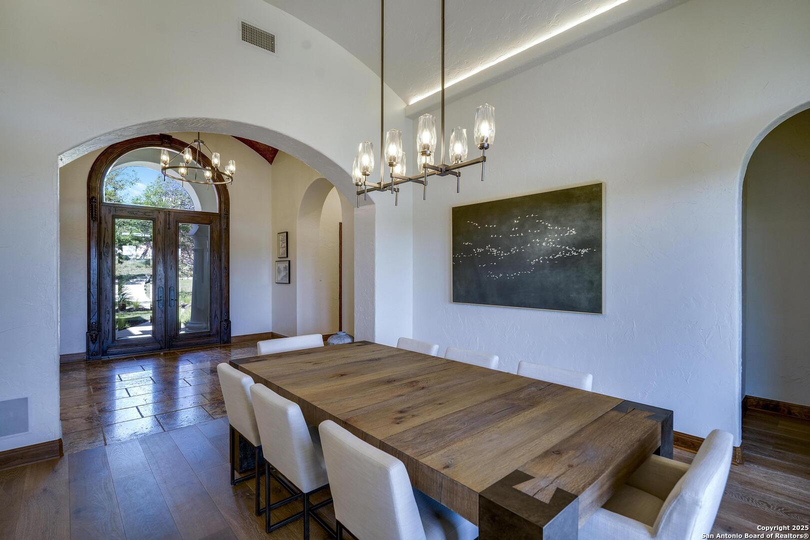 307 Augusta Boerne, TX 78006 - Photo 11 of 90 a view of a dining room with furniture and wooden floor