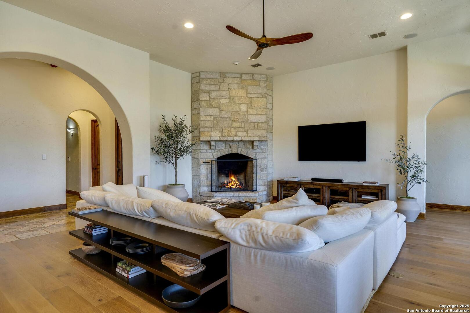 307 Augusta Boerne, TX 78006 - Photo 15 of 90 a living room with furniture fireplace and flat screen tv