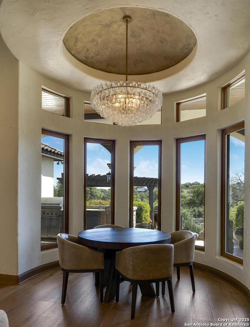 307 Augusta Boerne, TX 78006 - Photo 17 of 90 a dining room with furniture and wooden floor