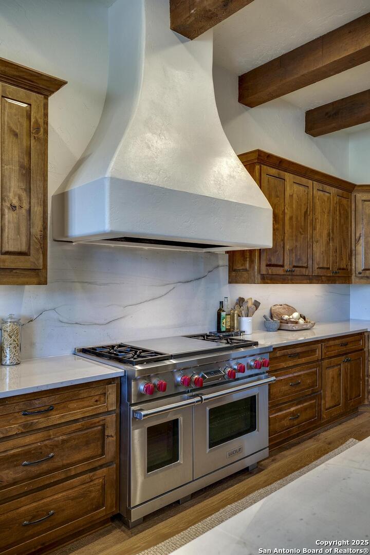 307 Augusta Boerne, TX 78006 - Photo 22 of 90 a kitchen with stainless steel appliances a stove and a microwave