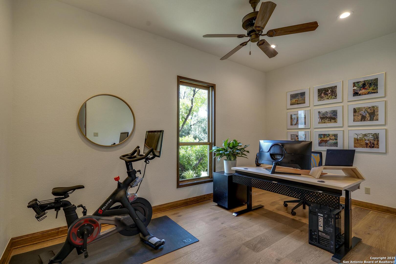 307 Augusta Boerne, TX 78006 - Photo 32 of 90 a view of a workspace with furniture and a window