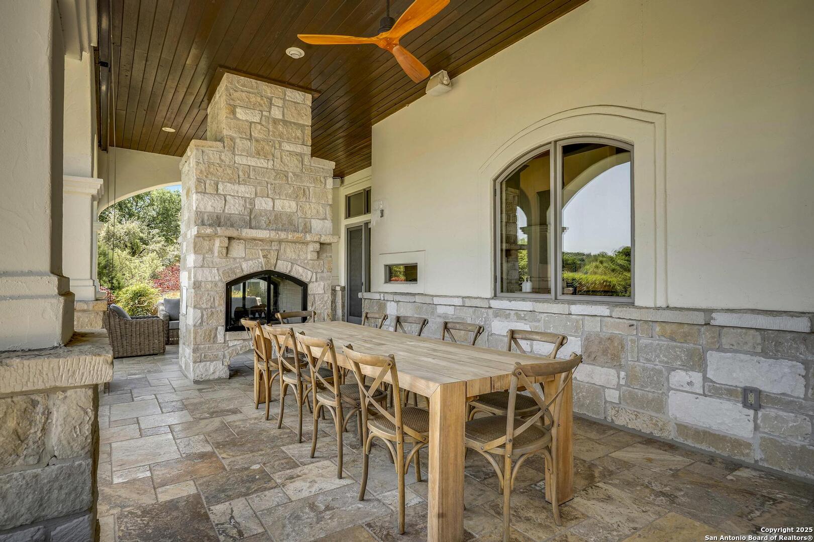 307 Augusta Boerne, TX 78006 - Photo 72 of 90 a view of a dining room with furniture window and fire place