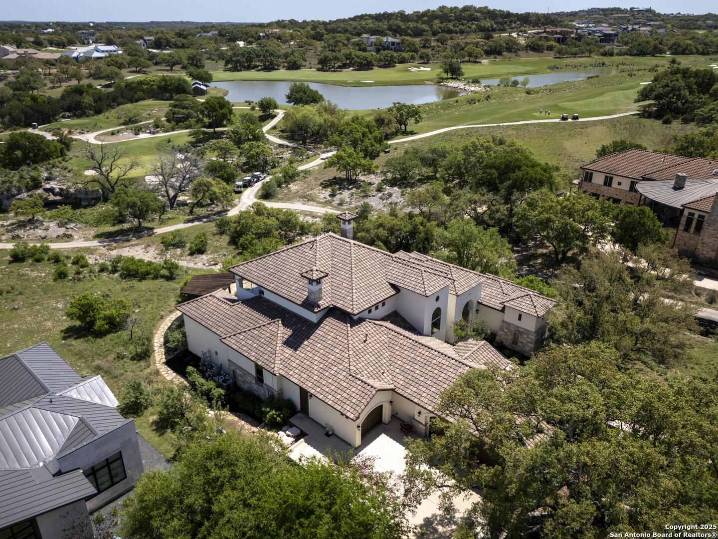 307 Augusta Boerne, TX 78006 - Photo 86 of 90 an aerial view of a house with a lake view