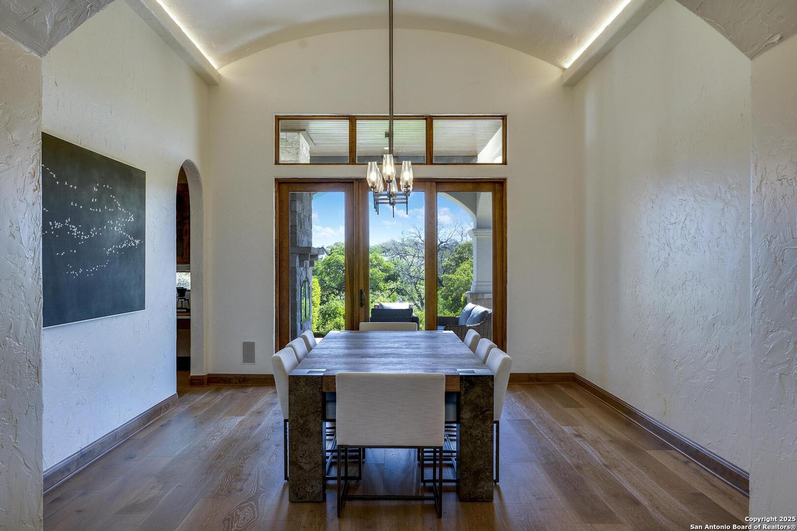 307 Augusta Boerne, TX 78006 - Photo 9 of 90 a view of a dining room with furniture window and wooden floor
