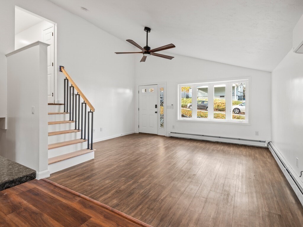38 Hilda Street, Unit 1 Worcester, MA 01606 - Photo 2 of 38 wooden floor in an empty room with a window
