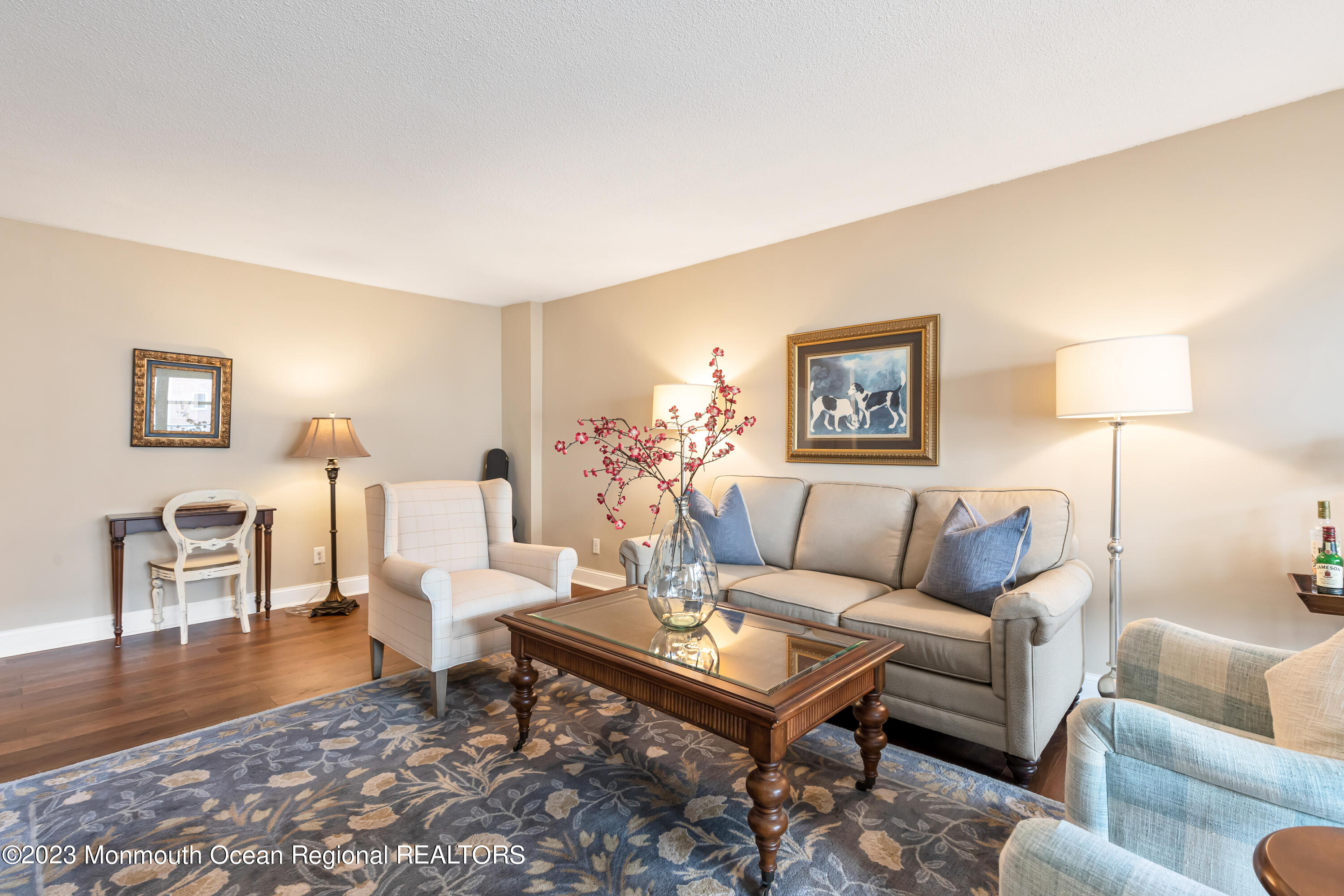 28 Riverside Avenue, Unit 7K Red Bank, NJ 07701 - Photo 8 of 30 a living room with furniture and wooden floor