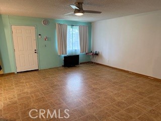23848 Hoag Road Corning, CA 96021 - Photo 3 of 8 an empty room with windows