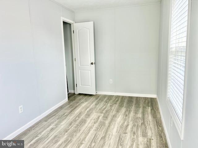 26 2nd Street Lothian, MD 20711 - Photo 14 of 27 a view of room with window and hardwood floor