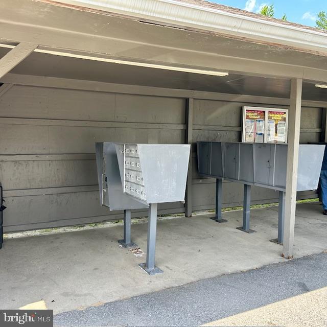 26 2nd Street Lothian, MD 20711 - Photo 24 of 27 a bench sitting in a room