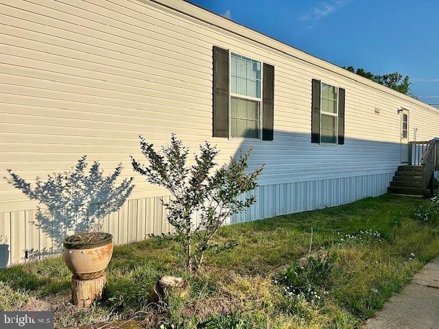 26 2nd Street Lothian, MD 20711 - Photo 3 of 27 a front view of a house with garden
