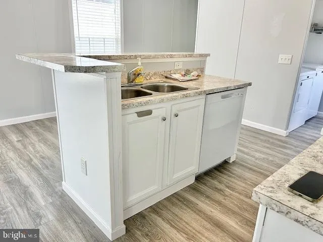 a utility room with washer and dryer