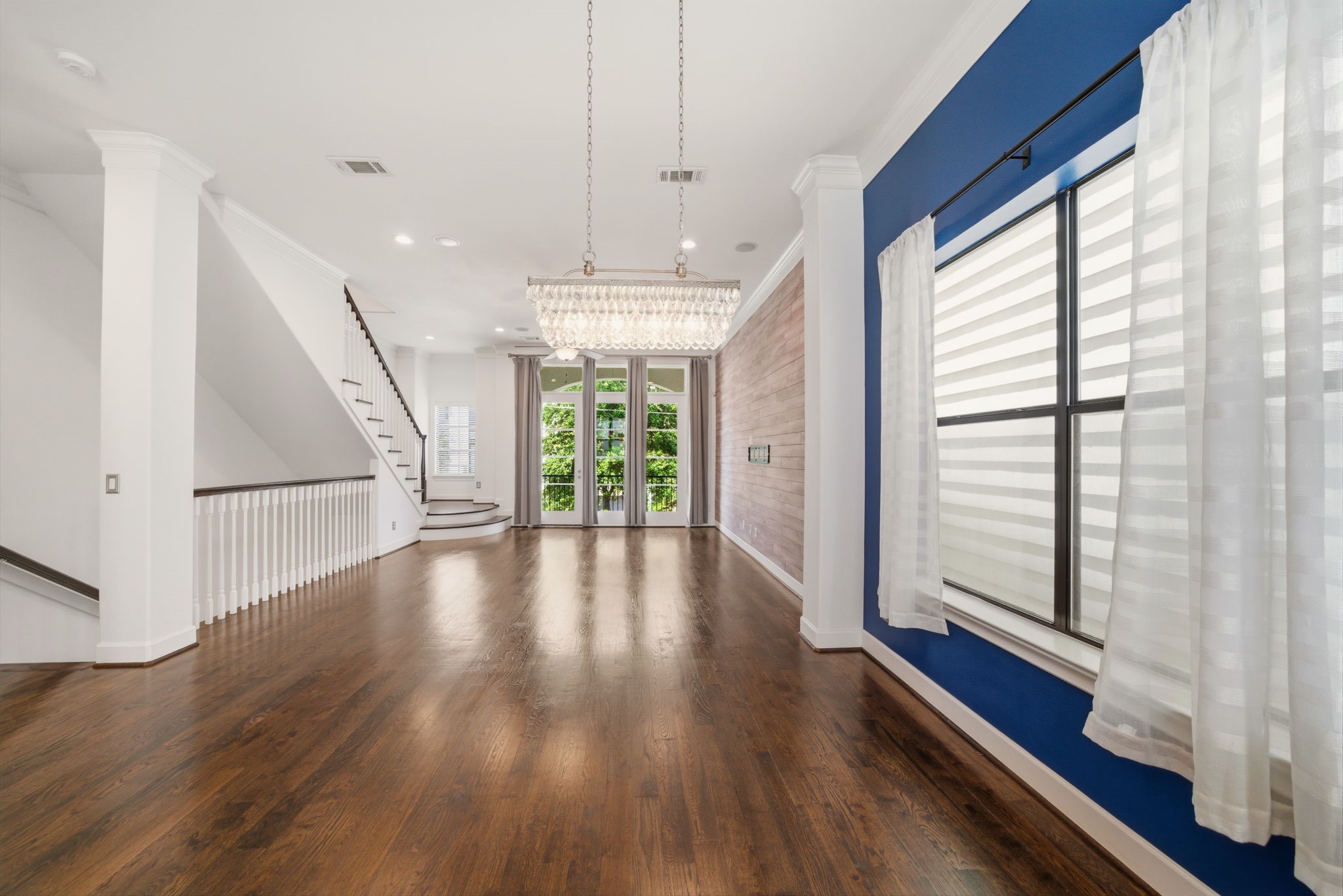 911 West Drew Street Houston, TX 77006 - Photo 8 of 44 a view of an entryway with wooden floor