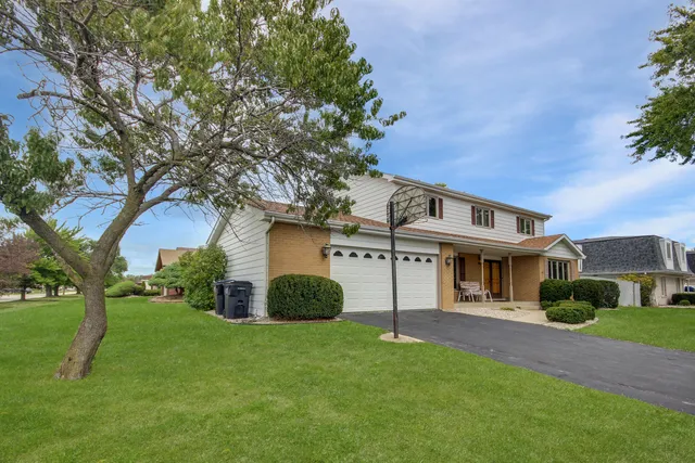 a view of outdoor space yard and front view of a house