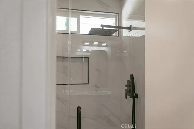 a bathroom with a mirror