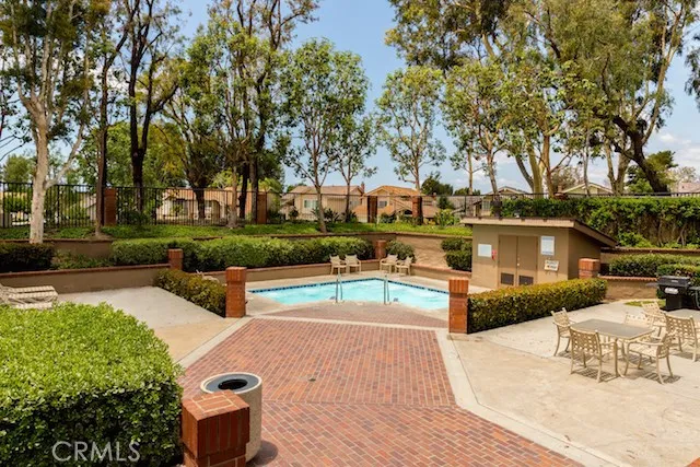 a view of a swimming pool with a patio