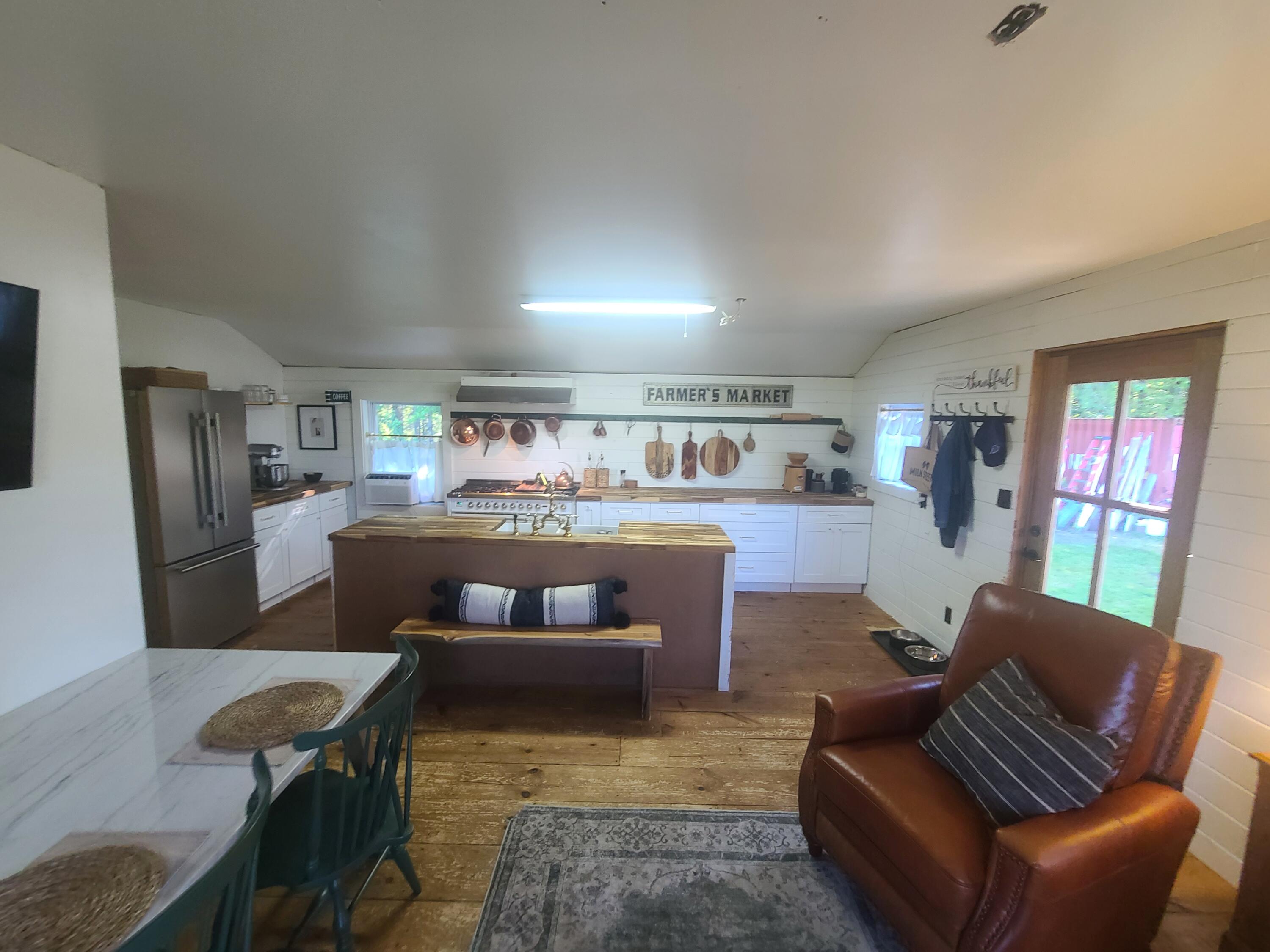 194 Wellington Road Parkman, ME 04443 - Photo 9 of 45 194 Wellington Living Dining Kitchen