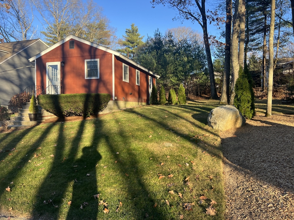 5 2nd Road, Unit 5 Hopkinton, MA 01748 - Photo 2 of 19 a front view of a house with a yard