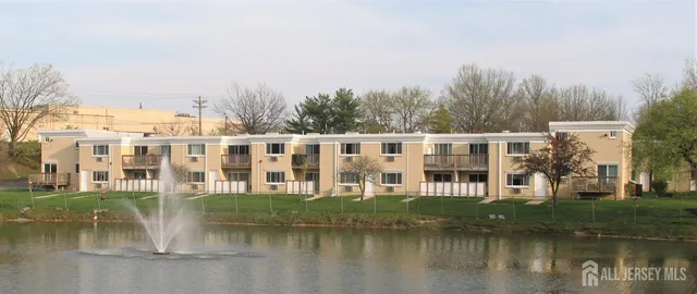 a view of a house with a lake view