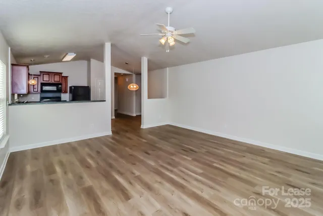 a view of a livingroom with a furniture