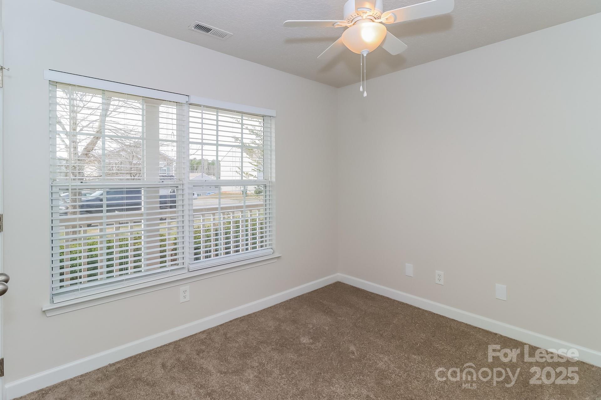 3624 Crowders View Drive Gastonia, NC 28052 - Photo 10 of 16 an empty room with a window