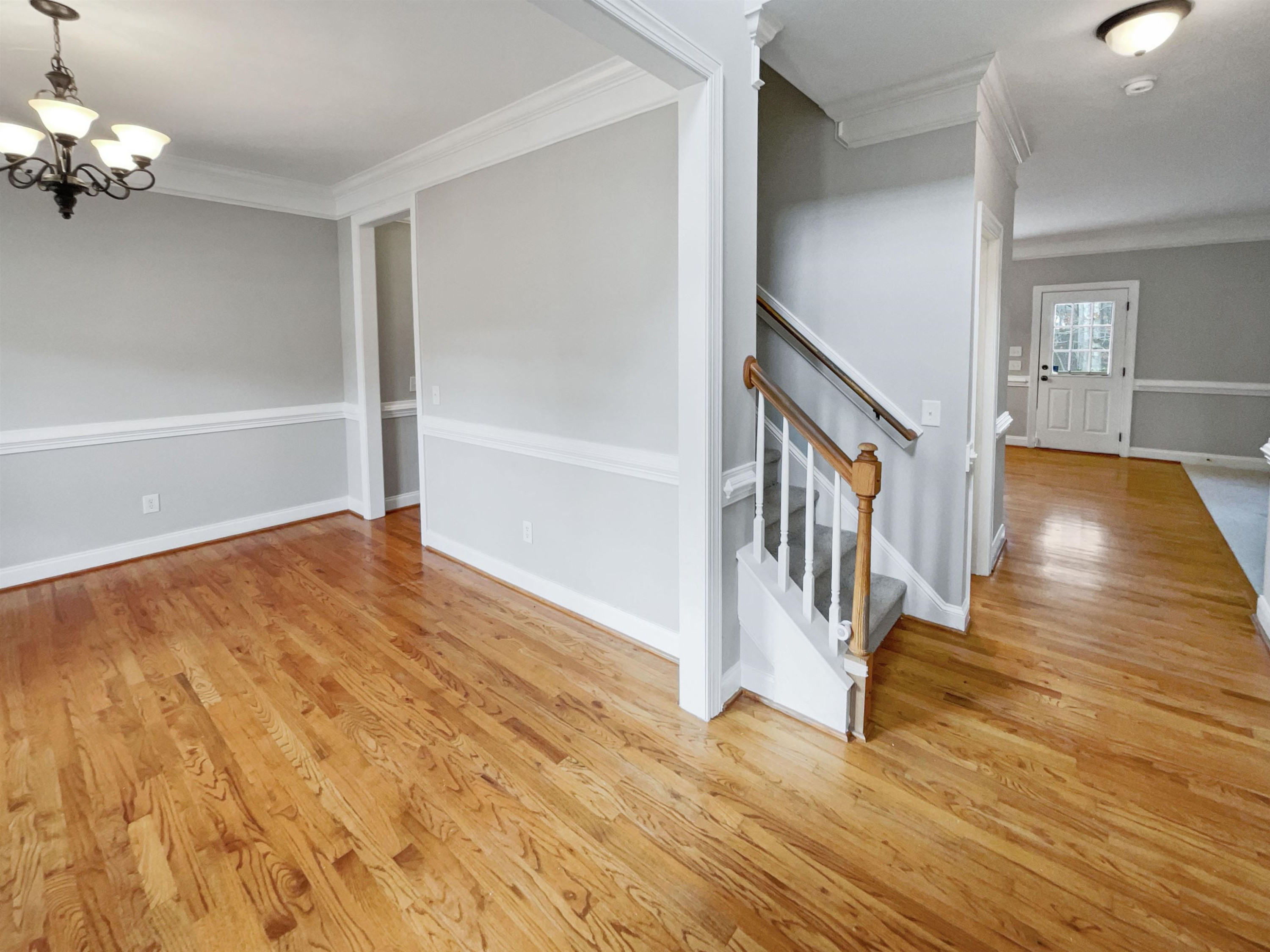 90 Bertram Drive Clayton, NC 27520 - Photo 2 of 19 a view of an entryway with wooden floor