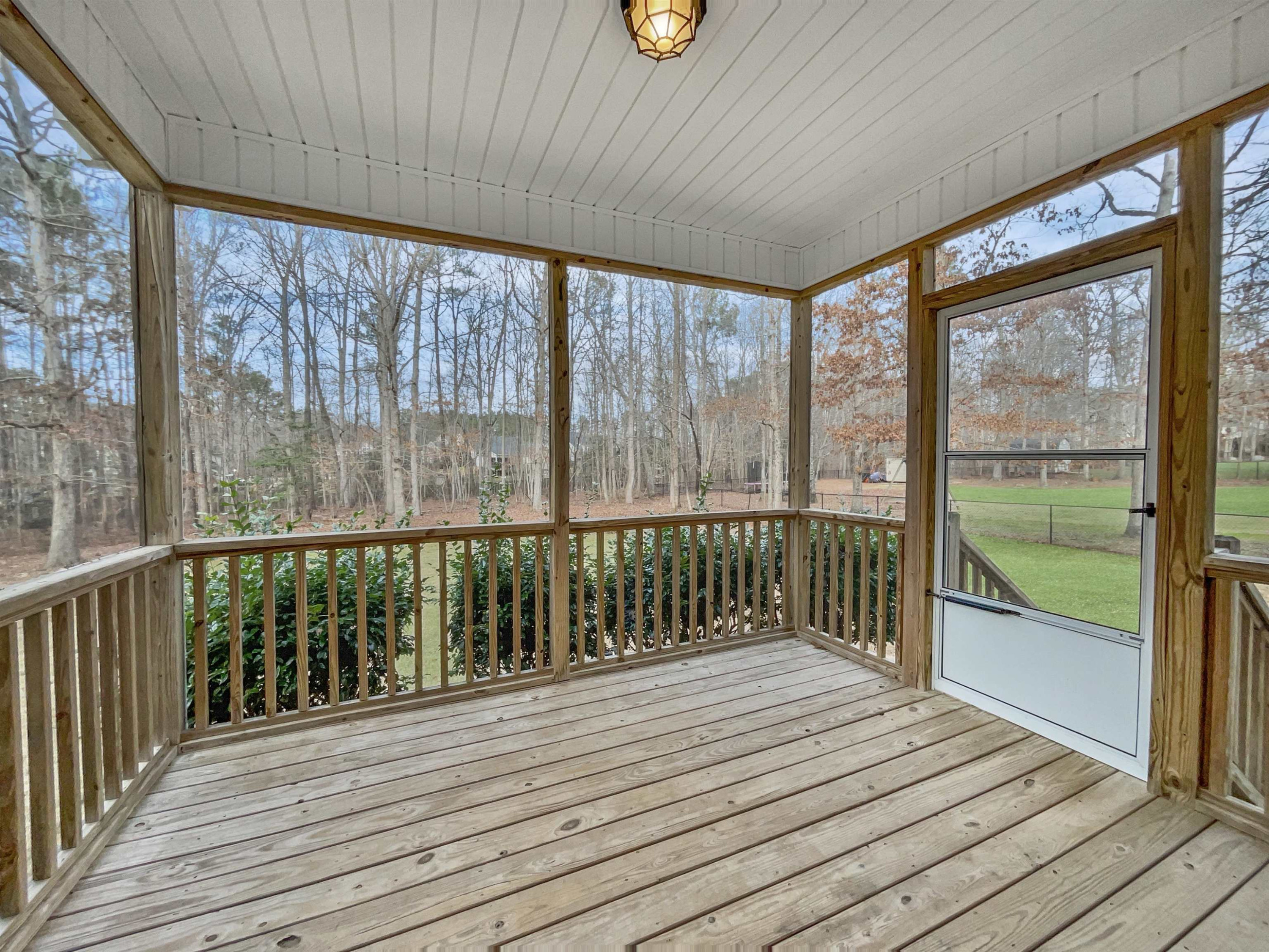 90 Bertram Drive Clayton, NC 27520 - Photo 9 of 19 a view of a balcony with wooden floor