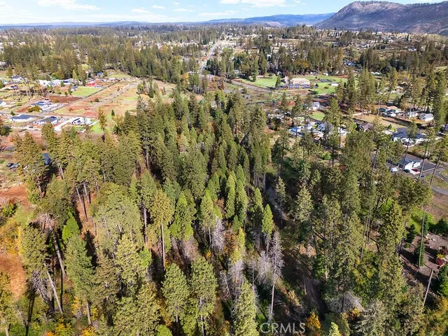 an aerial view of residential house with parking space