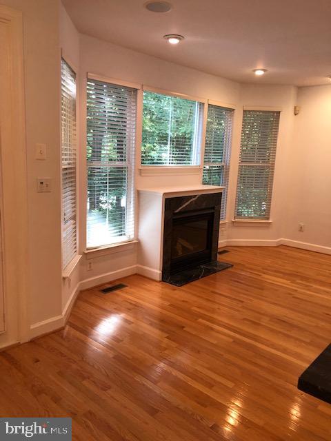 11519 Waterhaven Court Reston, VA 20190 - Photo 9 of 21 Family Room off Kitchen with new hardwood
