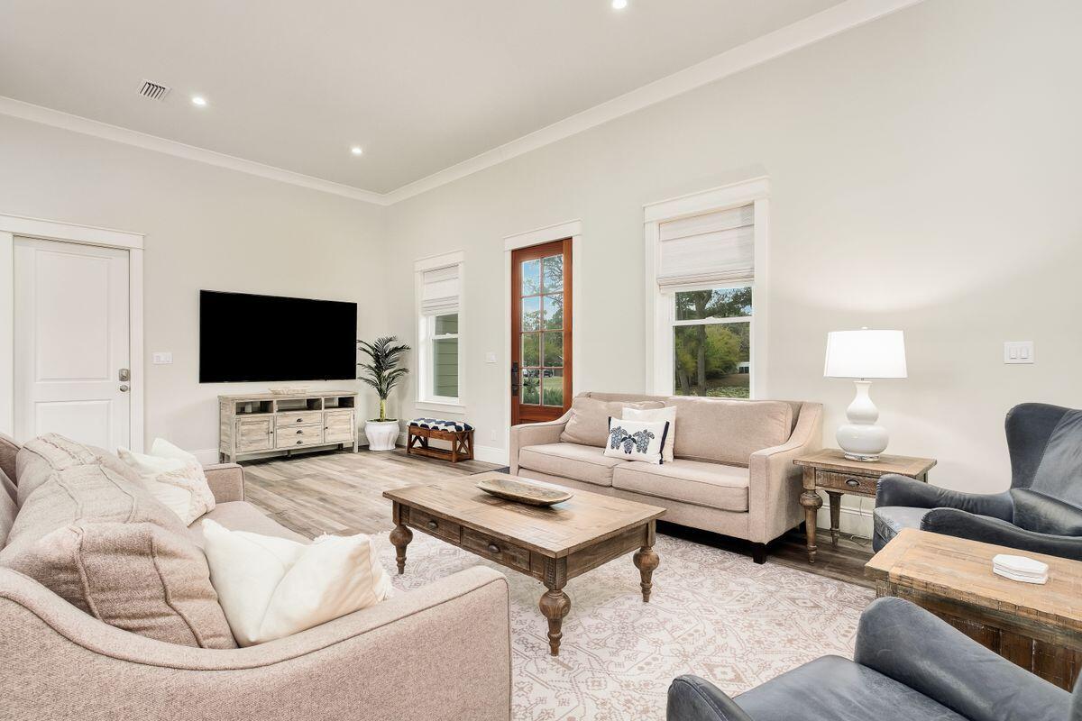 240 Overlook Drive Miramar Beach, FL 32550 - Photo 11 of 47 a living room with furniture and a flat screen tv
