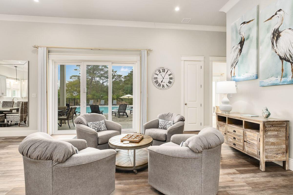 240 Overlook Drive Miramar Beach, FL 32550 - Photo 13 of 47 a living room with furniture and a large window