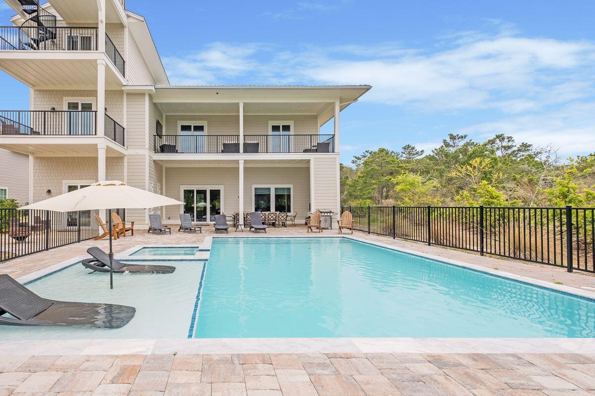 240 Overlook Drive Miramar Beach, FL 32550 - Photo 14 of 47 a view of a house with swimming pool and sitting area