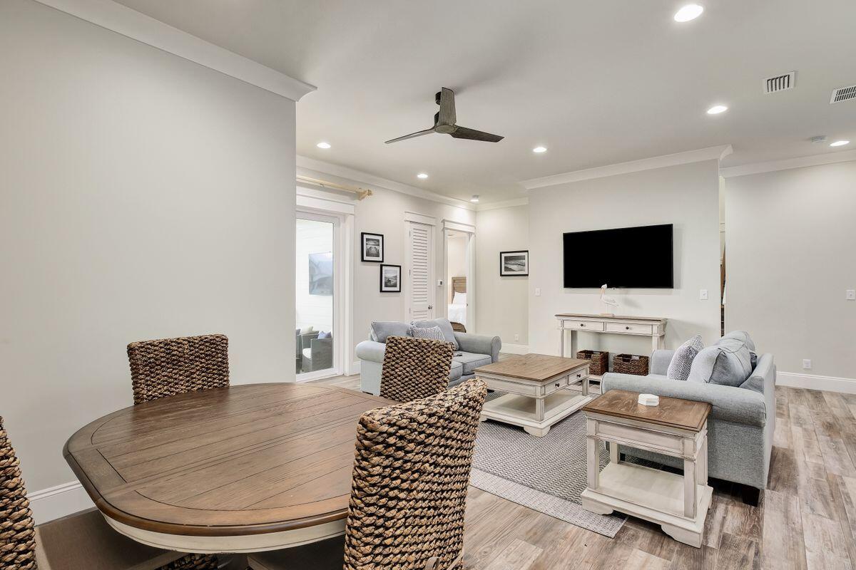 240 Overlook Drive Miramar Beach, FL 32550 - Photo 21 of 47 a living room with furniture and a flat screen tv