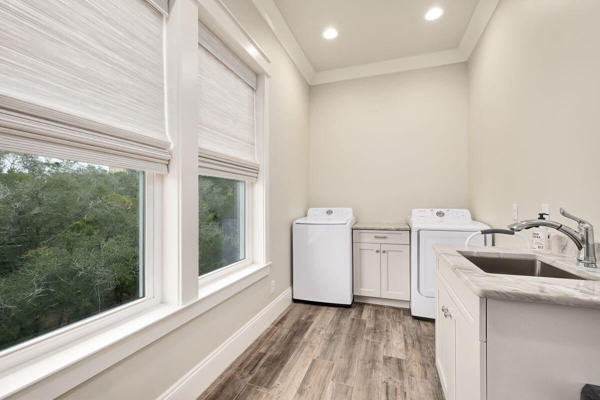 240 Overlook Drive Miramar Beach, FL 32550 - Photo 29 of 47 a view of storage and utility room with washer and dryer