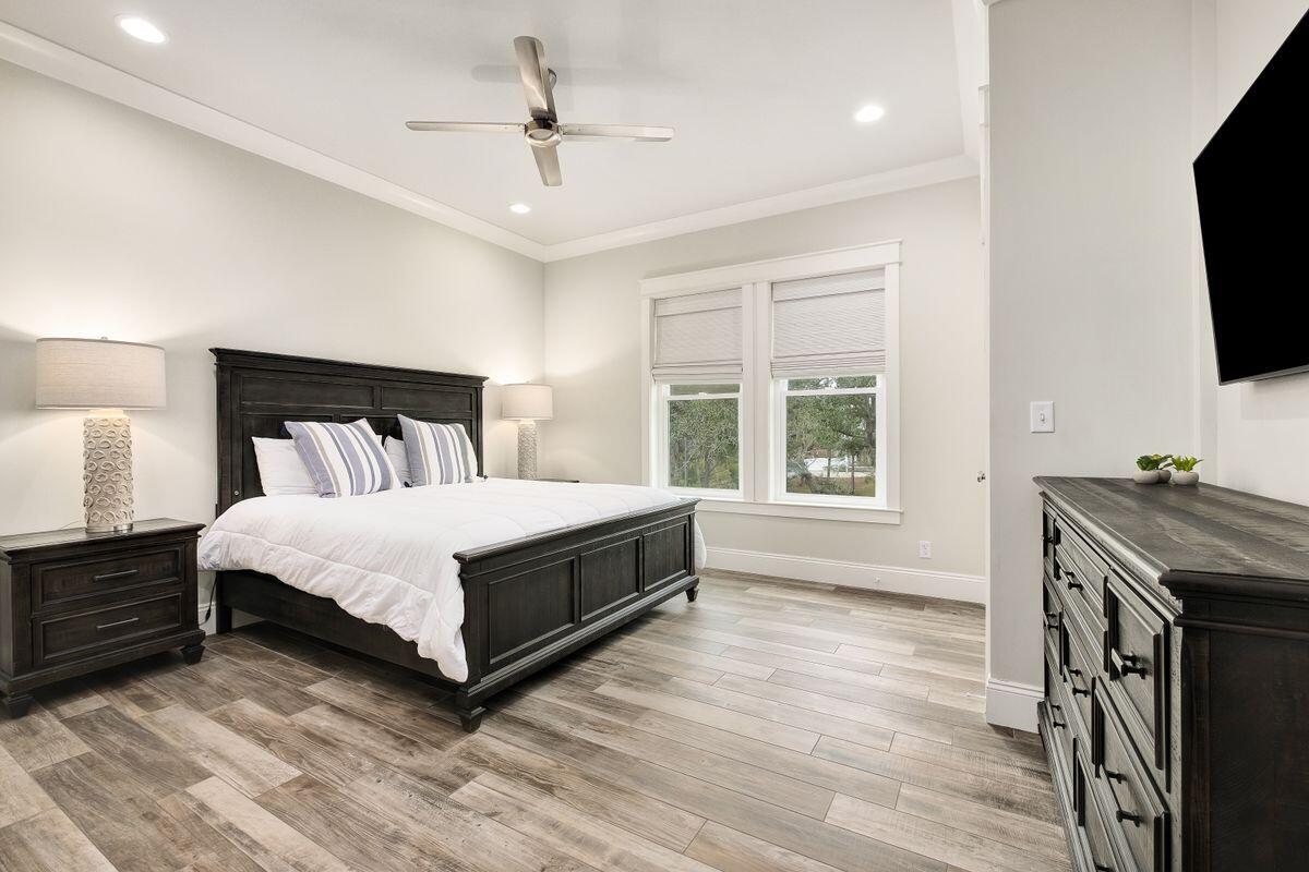 240 Overlook Drive Miramar Beach, FL 32550 - Photo 31 of 47 a bedroom with a bed and a flat screen tv