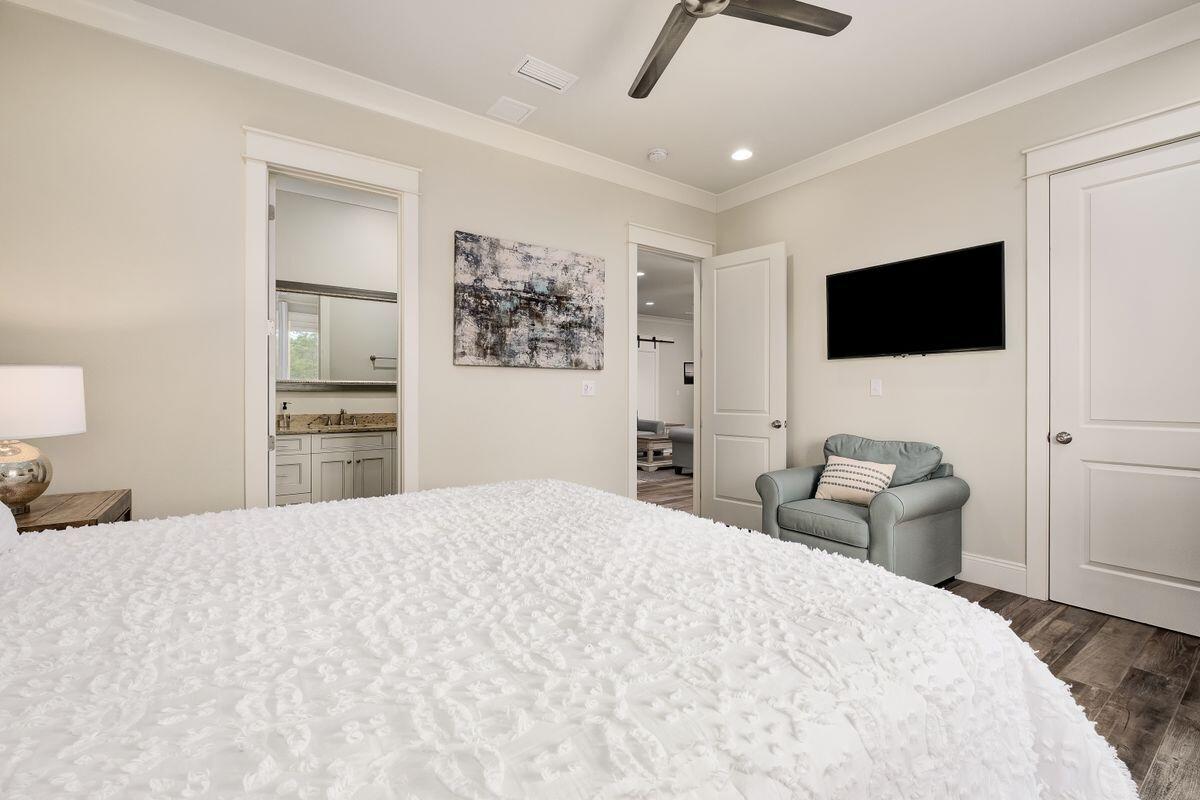 240 Overlook Drive Miramar Beach, FL 32550 - Photo 35 of 47 a bedroom with a bed and a flat screen tv