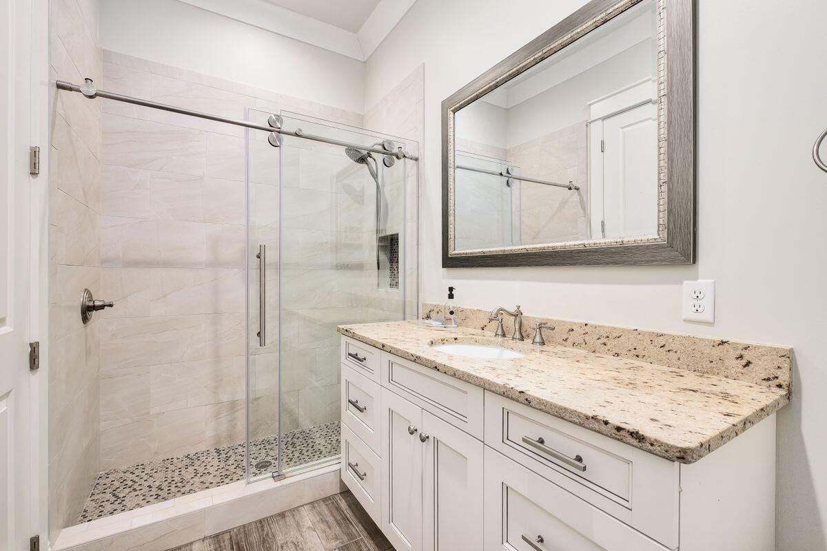 240 Overlook Drive Miramar Beach, FL 32550 - Photo 36 of 47 a bathroom with a sink and a mirror
