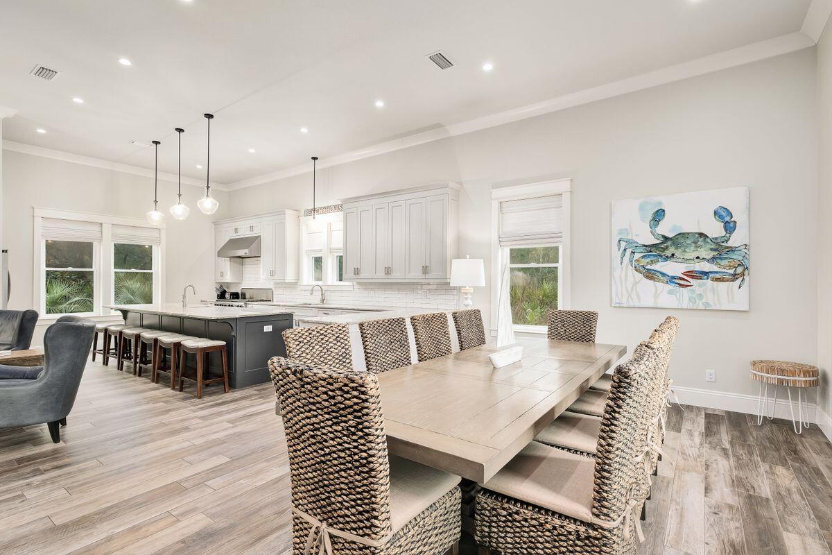240 Overlook Drive Miramar Beach, FL 32550 - Photo 5 of 47 a large kitchen with a table and chairs