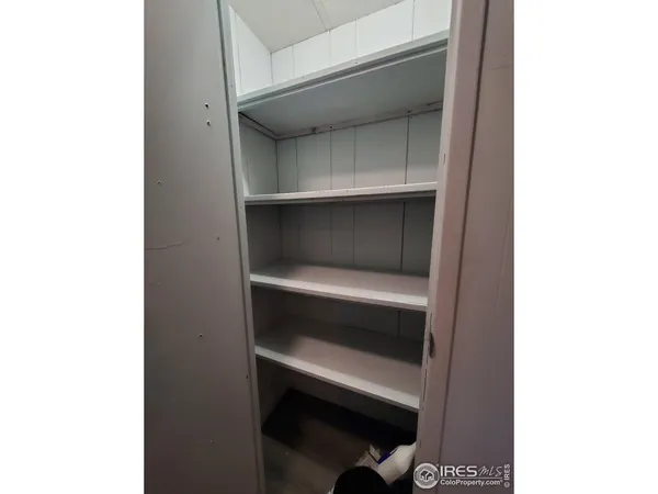 a kitchen with stainless steel appliances a refrigerator sink and cabinets