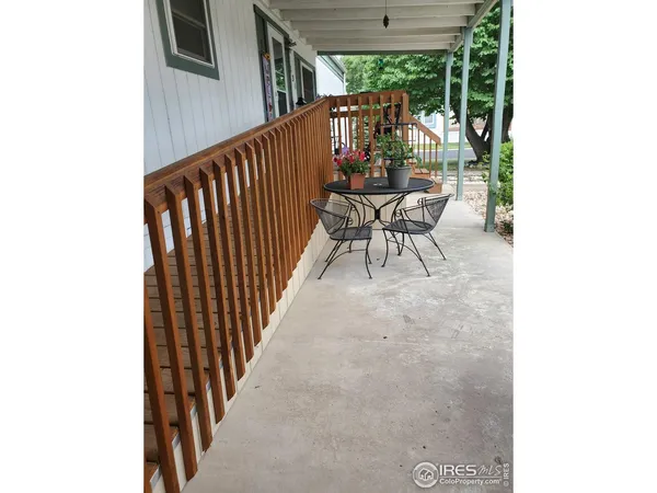 a view of balcony with furniture