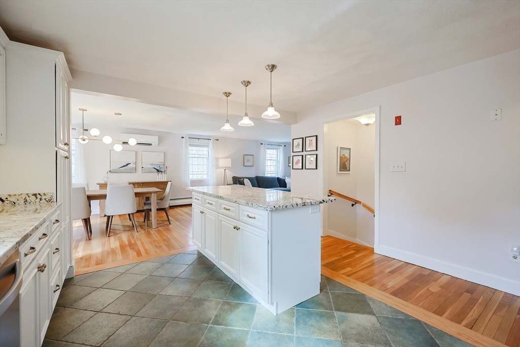 23 Pine Ridge Circle Reading, MA 01867 - Photo 8 of 42 a large white kitchen with a large window