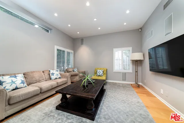 a living room with furniture and a couch