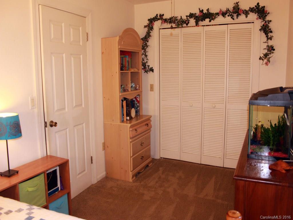 185 Loop Road Clyde, NC 28721 - Photo 14 of 24 a view of a storage & utility room with a window