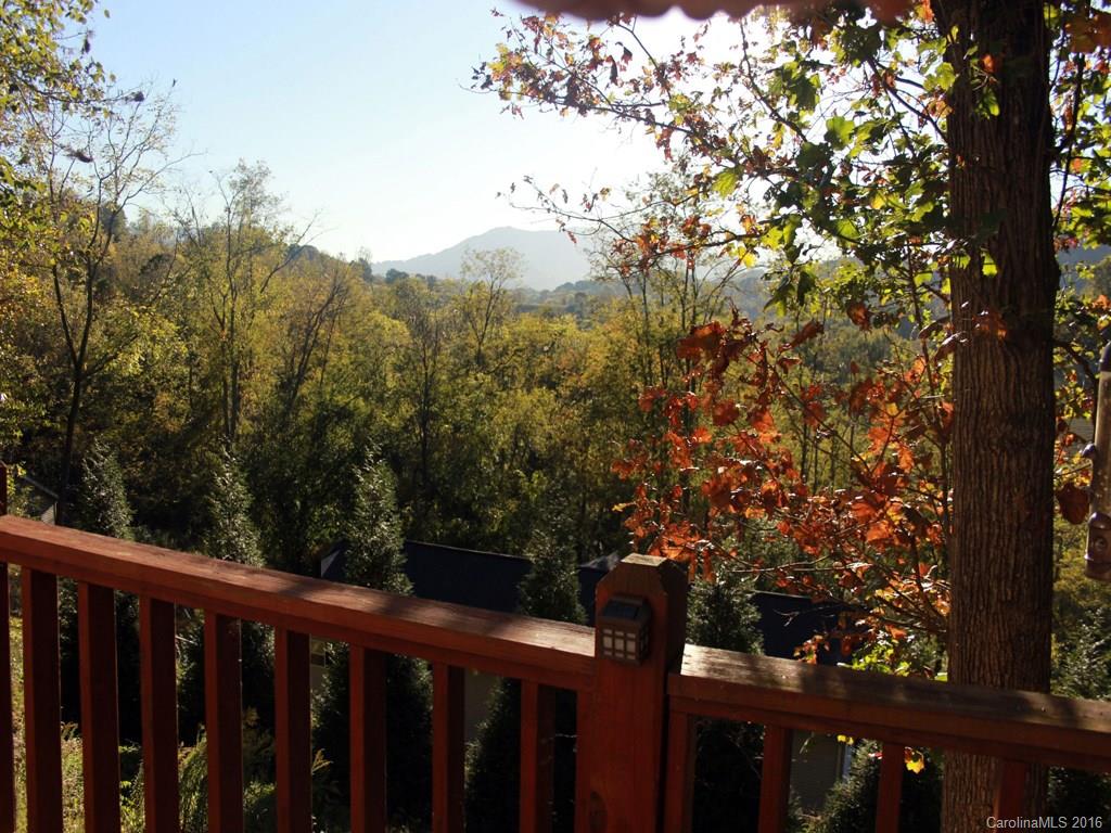 185 Loop Road Clyde, NC 28721 - Photo 20 of 24 a view of a wooden fence and trees