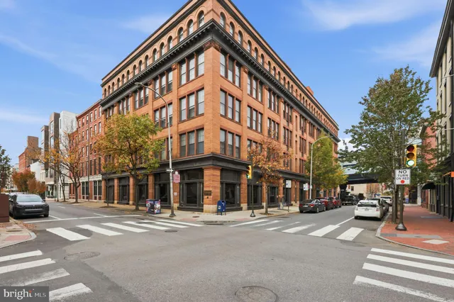 a view of a building with a street