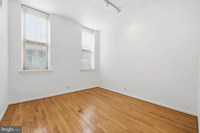 an empty room with windows