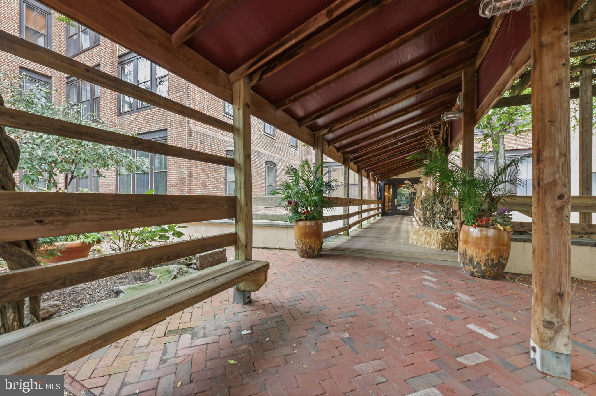 301 Race Street, Unit C010 Philadelphia, PA 19106 - Photo 23 of 27 a view of backyard with large tree