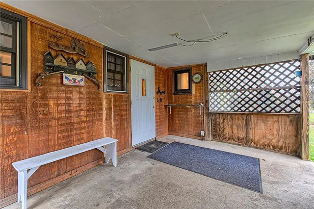 a view of a tiny house with a yard