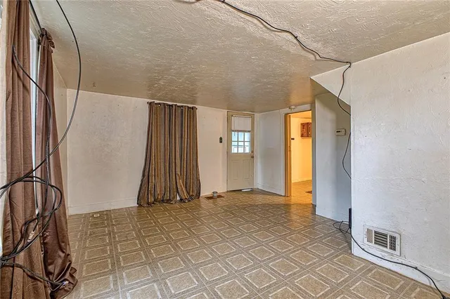 an empty room with a door