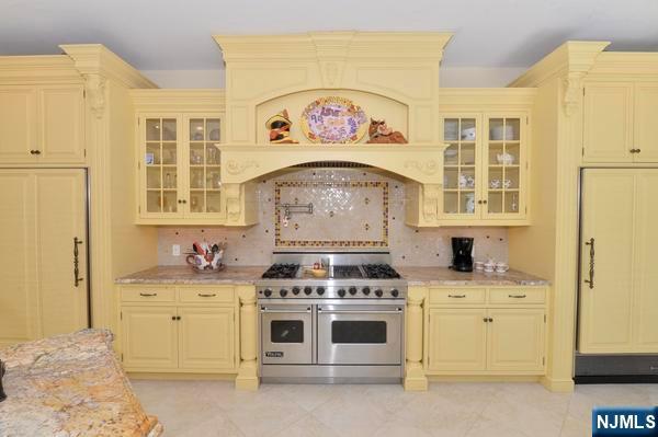 14 Werimus Brook Road Saddle River, NJ 07458 - Photo 11 of 50 a kitchen with a stove oven and a sink